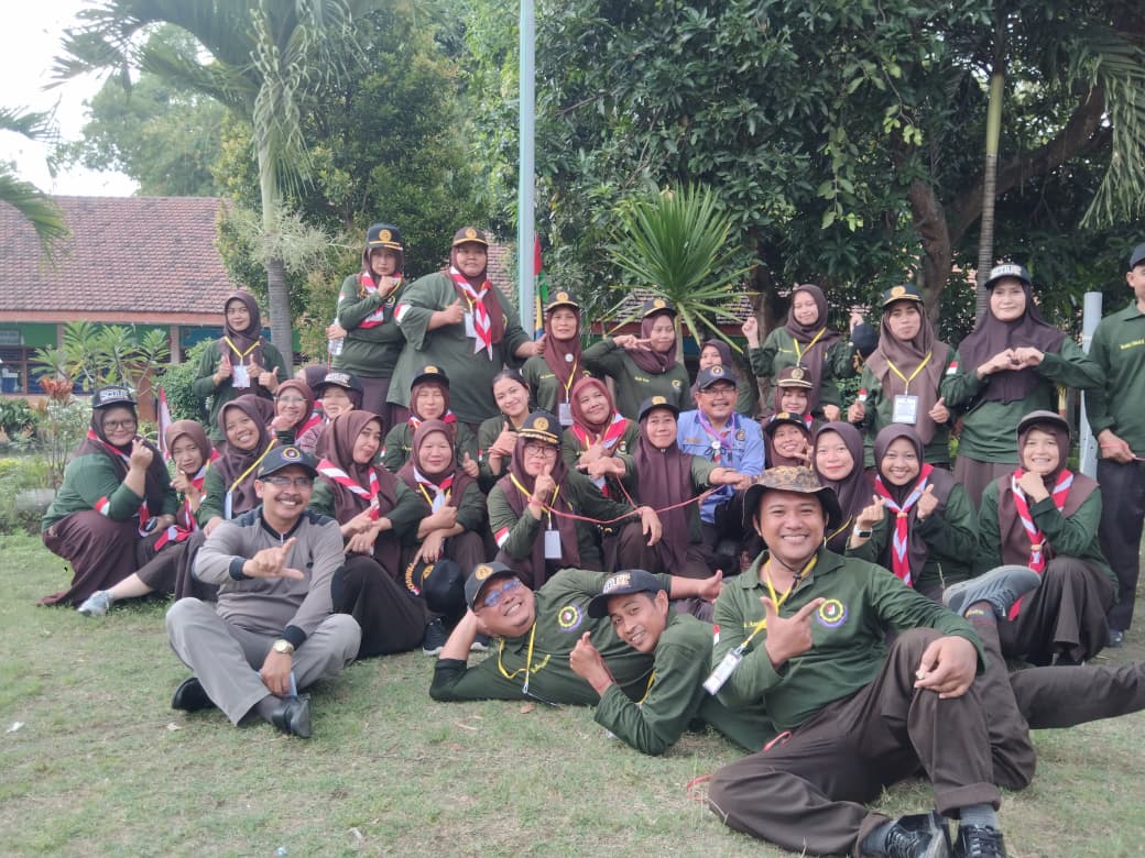 PENYALAAN API UNGGUN SIMBOL SEMANGAT KMD KWARRAN KUTOREJO